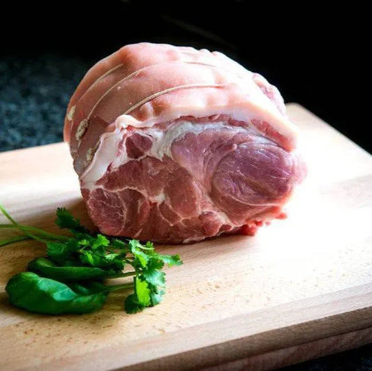 Boneless pork collar joint from Primrose Herd, showcasing a fresh, well-trimmed pork joint ready for cooking.