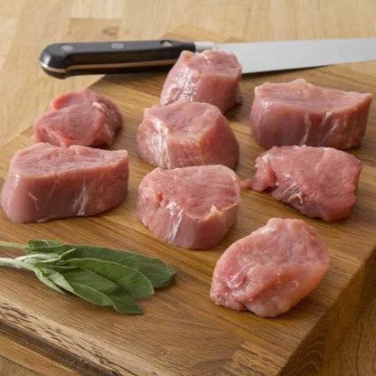Primrose Herd pork tenderloin medallions, thin pork steaks displayed in a close-up image, ready for cooking or grilling.