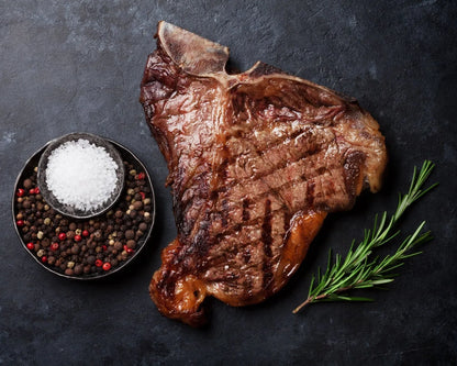 Prime Primrose Herd dry-aged beef T-bone steak 500g with marbled meat and bone, showcasing a fresh, high-quality beef cut.