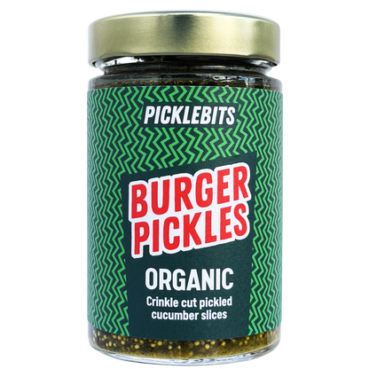 Jar of PICKLEBITS Burger Pickles with green label and gold lid on white background
