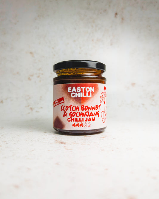 Easton Chilli Scotch Bonnet and Gochujang Chilli Jam jar with vibrant red chili jam visible inside.