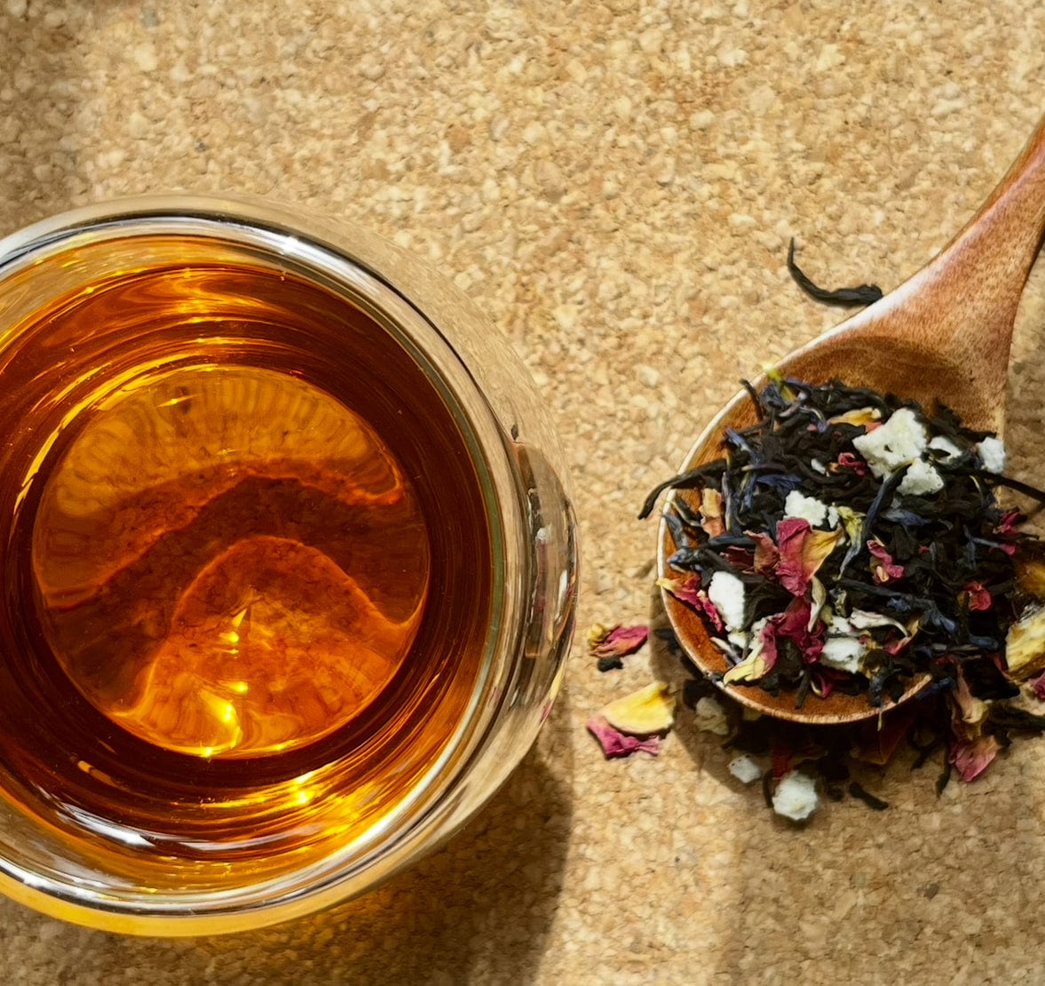 Loose leaf Pearl Grey black tea by Porter Hill Tea Company, featuring grey and black tea leaves in a clear jar.