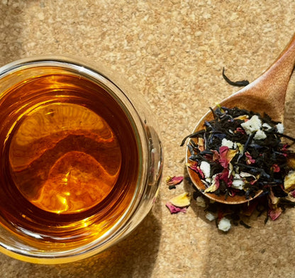Loose leaf Pearl Grey black tea by Porter Hill Tea Company, featuring grey and black tea leaves in a clear jar.