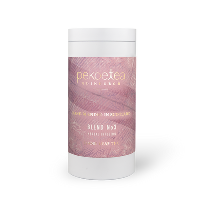 PekoeTea Edinburgh Blend No. 3 tea in a decorative tin caddy with a label, showcasing the premium tea packaging and branding.