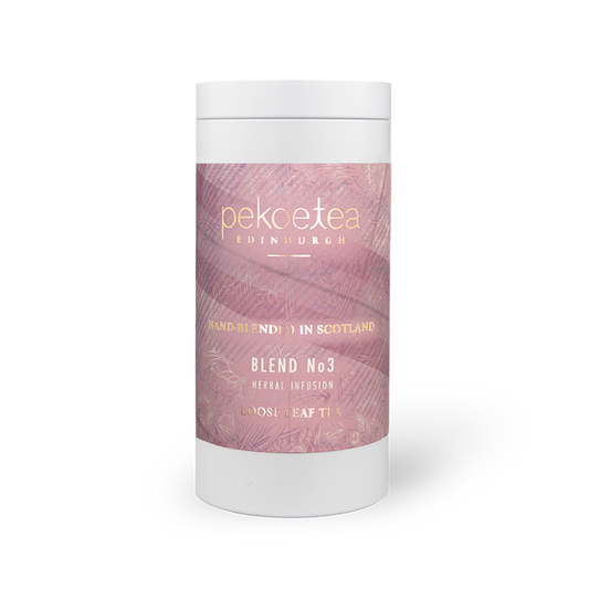 PekoeTea Edinburgh Blend No. 3 tea in a decorative tin caddy with a label, showcasing the premium tea packaging and branding.