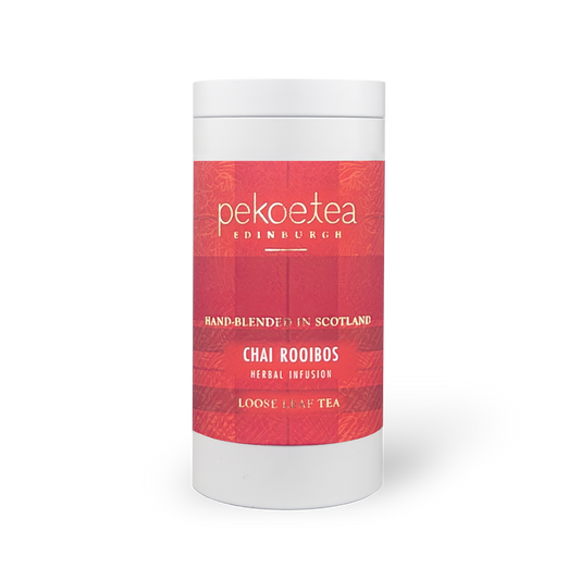 PekoeTea Edinburgh Chai Rooibos tea in a caddy with dried rooibos and chai spices, ready for brewing.