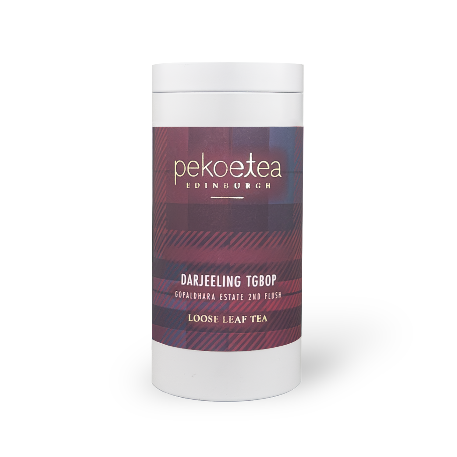 Pekoetea Edinburgh Gopaldhara TGBOP Second Flush Darjeeling tea in a metal caddy with tea leaves and packaging details visible