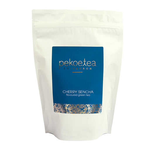 Pekoetea Edinburgh Cherry Sencha green tea in resealable pouch, featuring vibrant green tea leaves with cherry aroma.