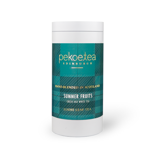 PekoeTea Edinburgh Summer Fruits tea caddy featuring colorful fruit illustrations and a sleek, compact storage container.
