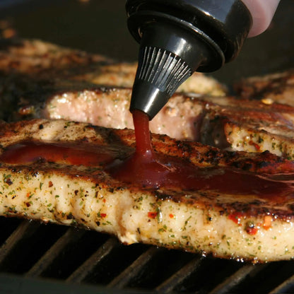 Hot Star Honey Asian Sauce Trio gift set with Korean BBQ sauce bottles on grilled steak, showcasing flavorful Asian condiments.