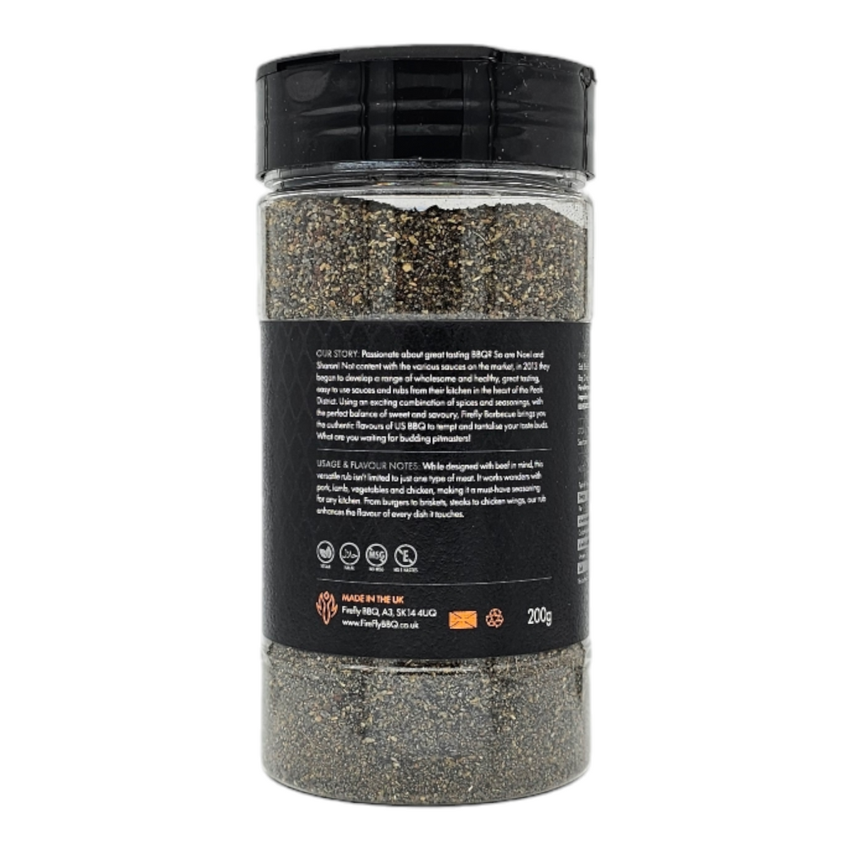Black Magic Charcoal Beef Rub by FireFly Barbecue, a smoky BBQ rub with black and charcoal-colored spices on a wooden surface.
