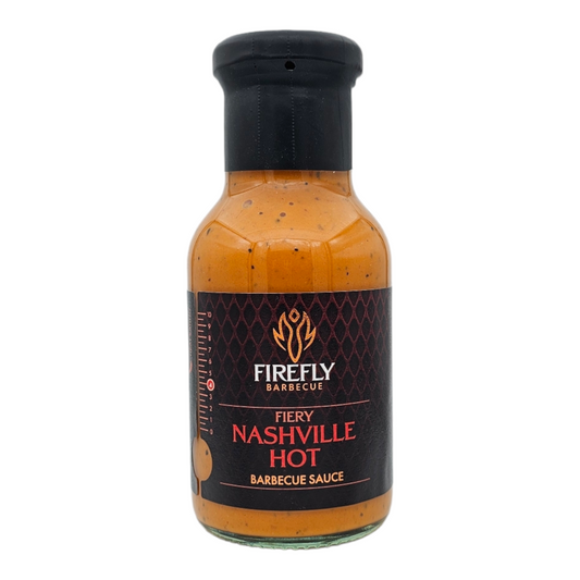 FireFly Barbecue Nashville Hot Sauce bottle, spicy BBQ sauce with vibrant label, ideal for grilling and marinades.