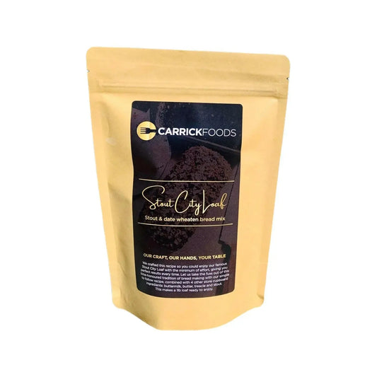 Carrick Foods Stout & Date Wheaten Loaf Bread Mix showing a prepared loaf with slices and ingredients on the side