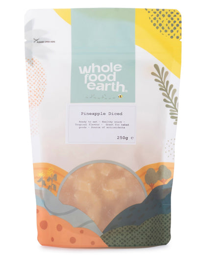 Dried pineapple diced pieces in a 250g package from Whole Food Earth, showcasing bright yellow dried pineapple chunks.