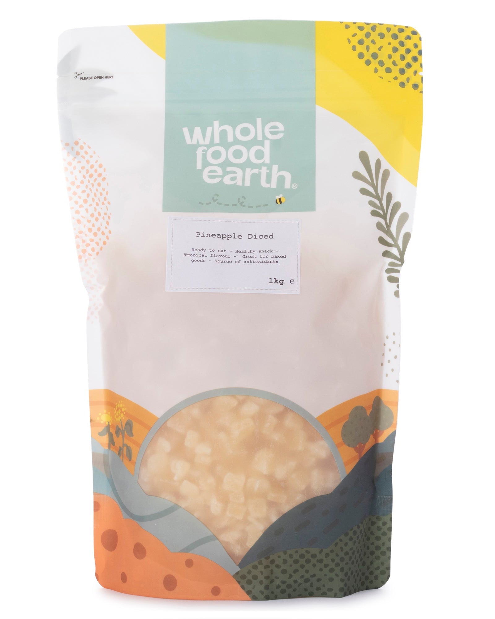 Dried pineapple dices in a 1kg package from Whole Food Earth, showing bright yellow dried pineapple pieces perfect for snacking or baking.