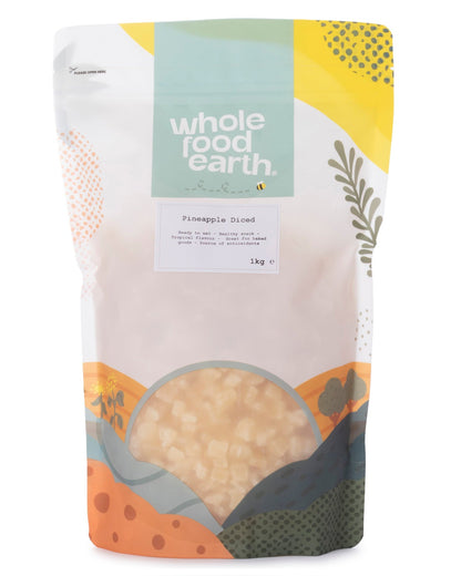 Dried pineapple dices in a 1kg package from Whole Food Earth, showing bright yellow dried pineapple pieces perfect for snacking or baking.