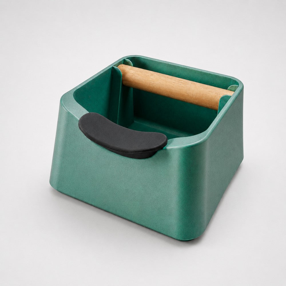 KNOCDIC® The Pod 3-in-1 espresso knock box with metallic green finish, portafilter stand, and oak wood knock bar for coffee grounds.