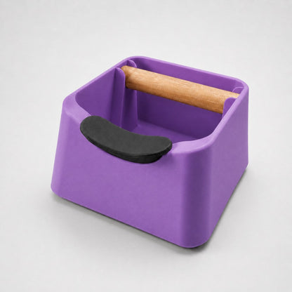 Purple KNOCDIC® Pod 3-in-1 espresso knock box with portafilter stand and oak wood knock bar for coffee grounds disposal.