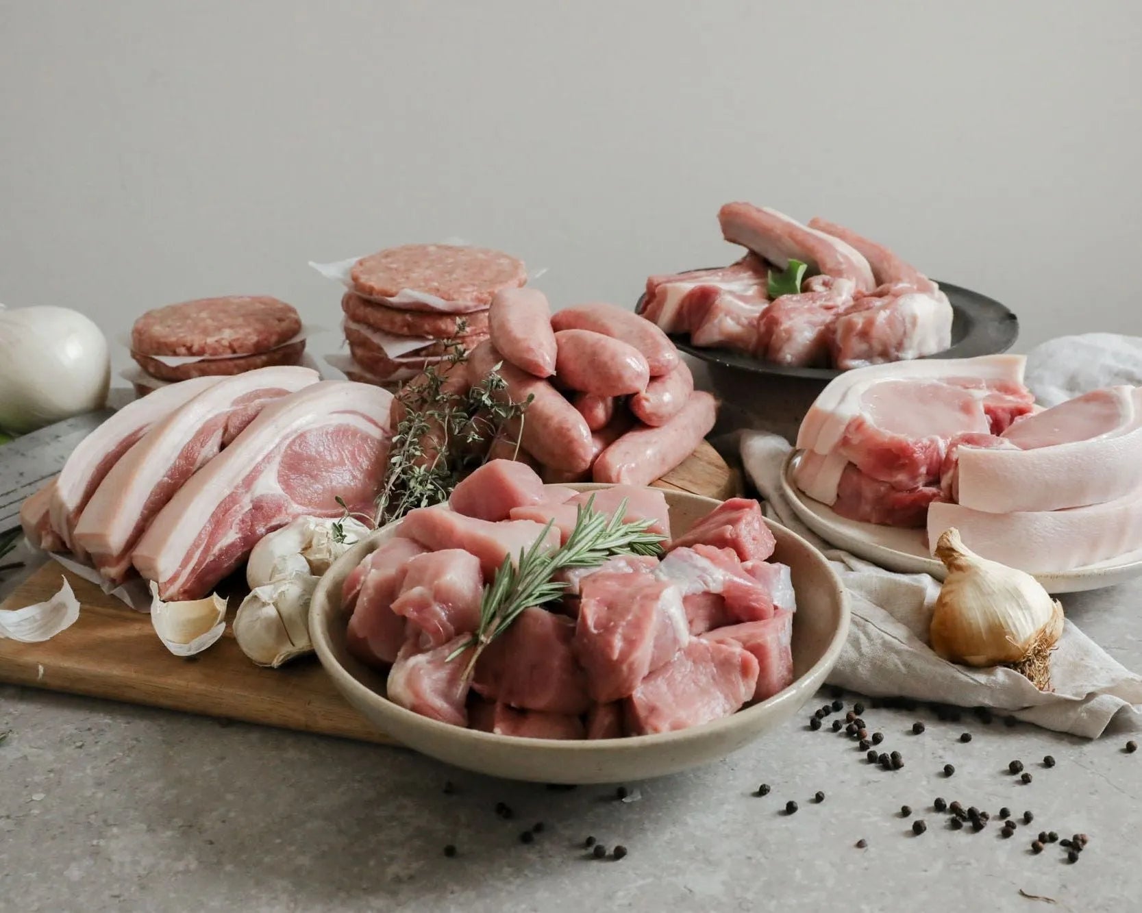 Small Primrose Herd Pork BBQ Pack featuring assorted pork cuts in a meat box for grilling and barbecues.