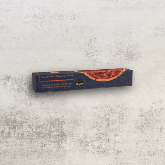 Sliced Bray Cured 45cm salami on a wooden board, part of a charcuterie selection, showcasing thin, flavorful slices.