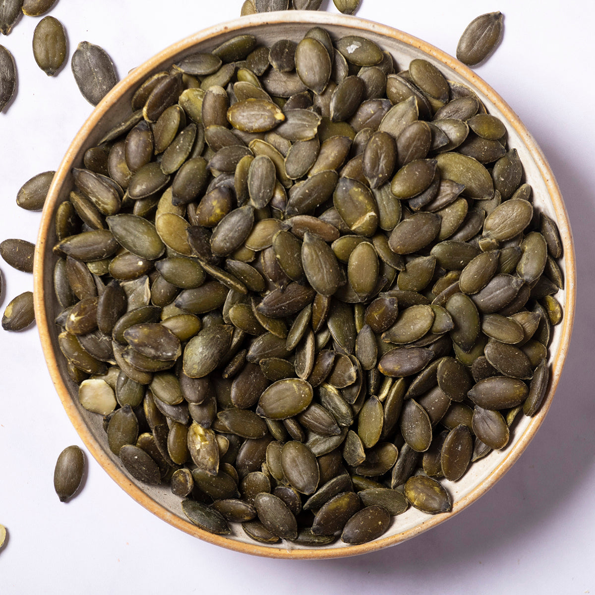 Whole Food Earth pumpkin seeds, crunchy and fresh nuts and seeds, shown in a close-up image.