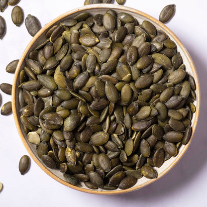 Whole Food Earth pumpkin seeds, crunchy and fresh nuts and seeds, shown in a close-up image.