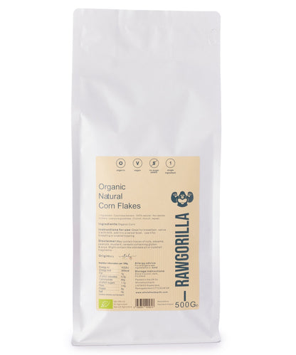 Organic Natural Corn Flakes cereal from RAWGORILLA in a 500g pack, made by Whole Food Earth, with golden corn flakes in a bowl.