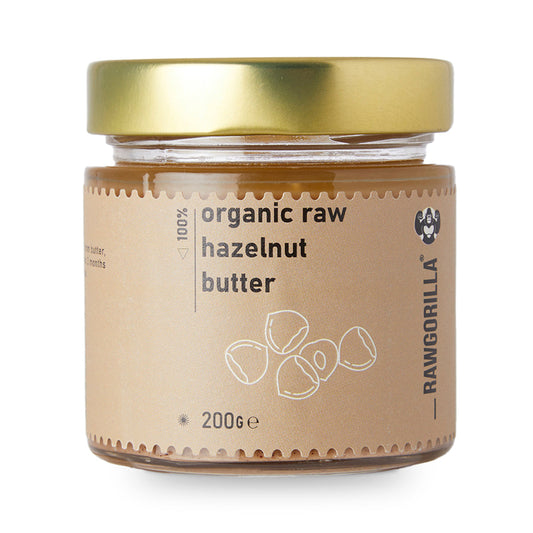 Organic raw hazelnut butter by RAWGORILLA, creamy nut butter from Whole Food Earth in a jar with a textured surface.