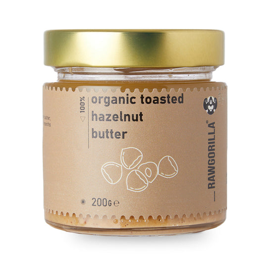 Organic toasted hazelnut butter from RAWGORILLA, smooth nut spread with rich hazelnut flavor, in a jar with a label.