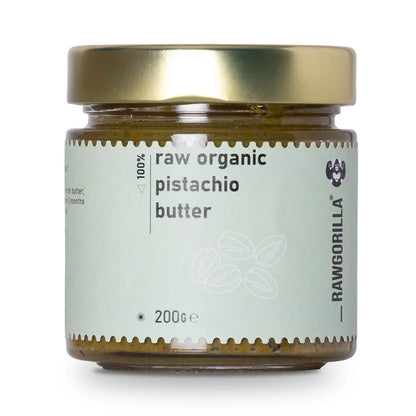 Creamy organic raw pistachio butter from RAWGORILLA, packaged in a jar, showcasing a smooth, natural nut butter texture.