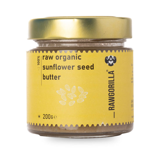 Raw organic sunflower seed butter from RAWGORILLA, a Whole Food Earth dip and spread, shown in a jar with a smooth, creamy texture.