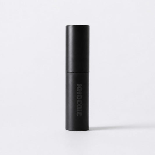 KNOCDIC® anti-static spray bottle for coffee beans, with a clear plastic container and spray nozzle, used for reducing static.