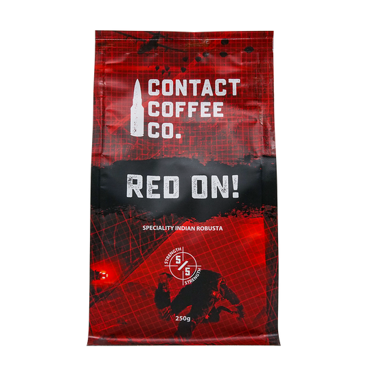 Red On! high-caffeine coffee from Contact Coffee Company Ltd., showcasing a brewed coffee cup with rich, dark liquid and a coffee bean.
