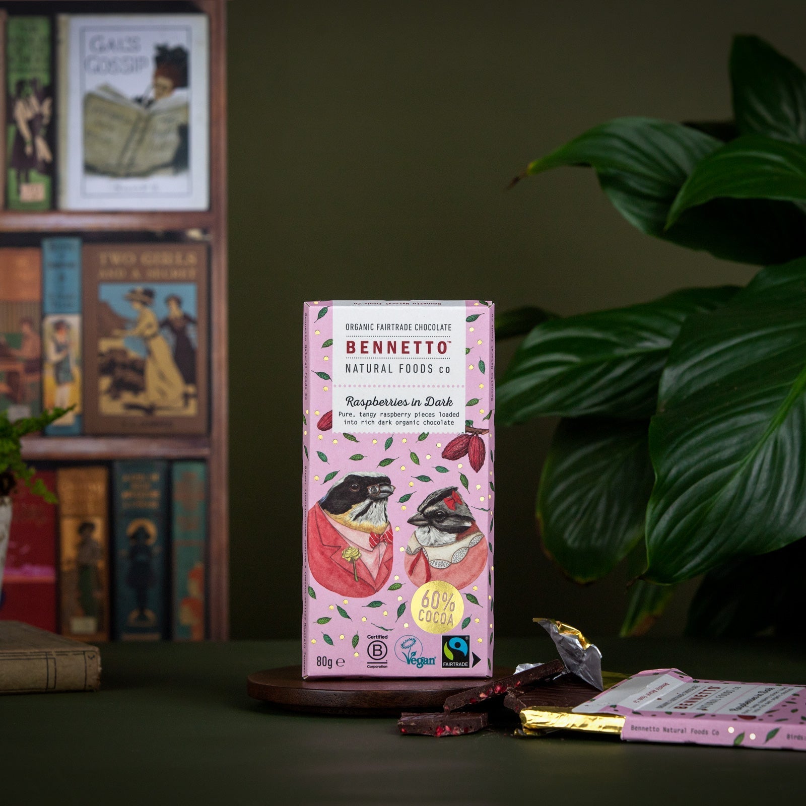 Dark chocolate with fresh raspberries from Bennetto Natural Foods UK, showing a close-up of raspberries embedded in rich dark chocolate.