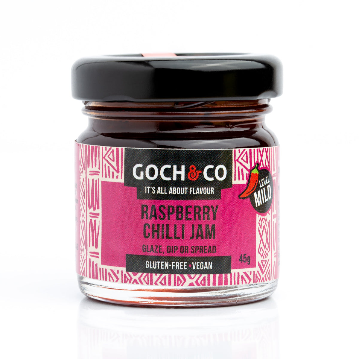 Small jar of Goch & Co Raspberry Chilli Jam showing the jar with pink raspberry jam and red chilli pieces inside.