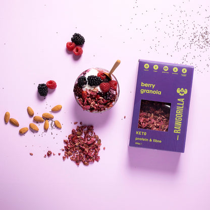 Organic berry granola cereal from Raw Gorilla, keto-friendly, 250g, with fresh berries and crunchy oats on a rustic background.