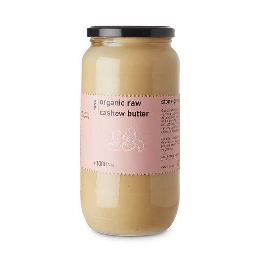 Creamy organic raw cashew butter in a jar from RawGorilla, made from whole food earth, showing smooth texture and natural color.
