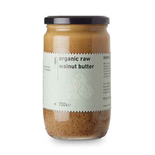 Creamy organic raw walnut butter in a jar from RawGorilla, made by Whole Food Earth, with a smooth texture and natural walnut color.