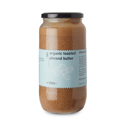 Organic toasted almond butter by RawGorilla in a jar, creamy nut butter with a smooth texture and natural almond flavor.