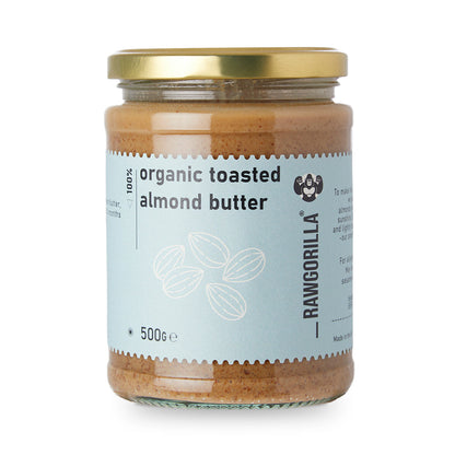 Organic toasted almond butter by RawGorilla in a jar, showcasing creamy almond spread with a natural, nutty texture.