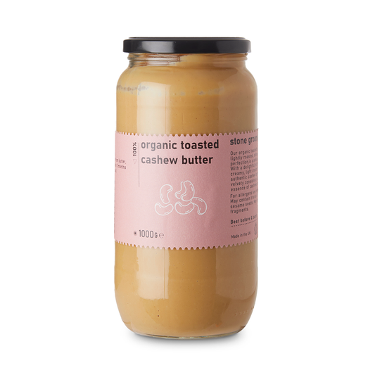 Organic toasted cashew butter from RawGorilla in a 1000g jar, creamy nut butter with a smooth texture and natural color.