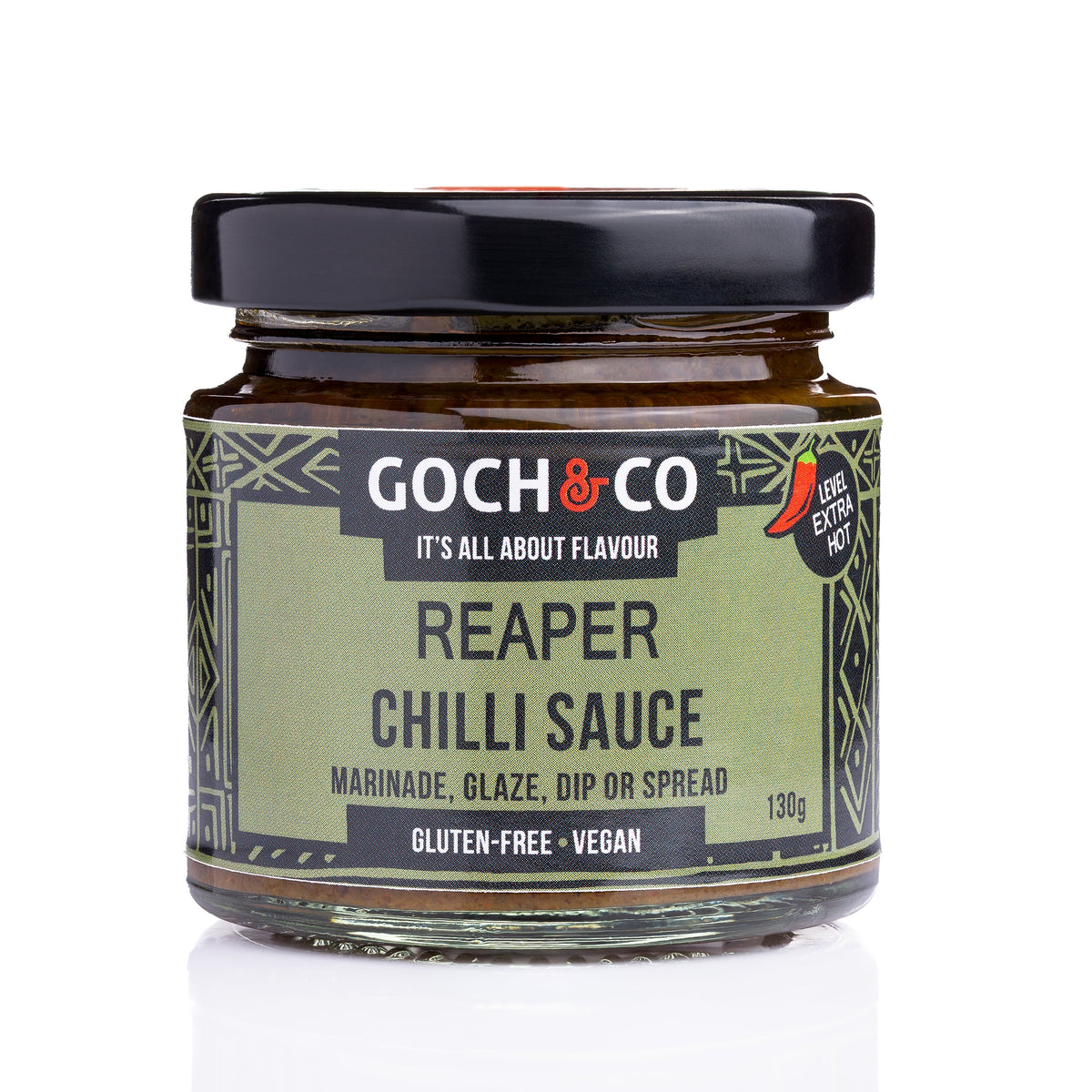 Reaper Chilli Sauce by Goch & Co in a glass bottle, showcasing vibrant red chili peppers and the spicy sauce inside.