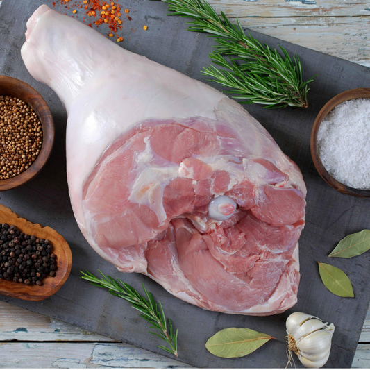 Primrose Herd pork joint showing a bone-in leg of pork on a clean surface, ready for cooking or roasting.