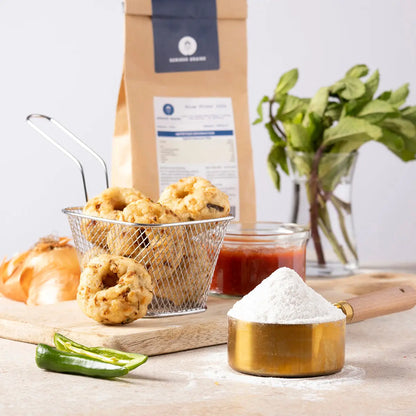Whole Food Earth 100% rice flour in a kitchen setting, showcasing its fine, white powder texture for gluten-free cooking and baking.
