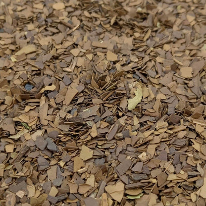 Loose roasted yerba mate leaves from Porter Hill Tea Company, a fruit and herbal tea blend with a rich, roasted appearance.
