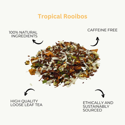 Loose leaf Tropical Rooibos tea by ArtisanBox featuring vibrant red and orange rooibos leaves in a clear glass jar.