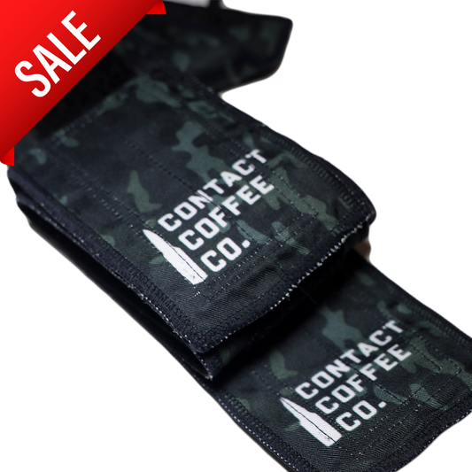 Camo gym wrist wraps from Contact Coffee Company Ltd. designed for support during weightlifting and fitness workouts.