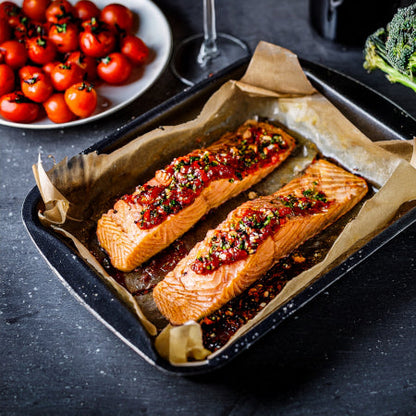 Bundle of five original chilli relish bottles from everythingCHILLI, with a close-up of salmon steaks topped with chilli relish.