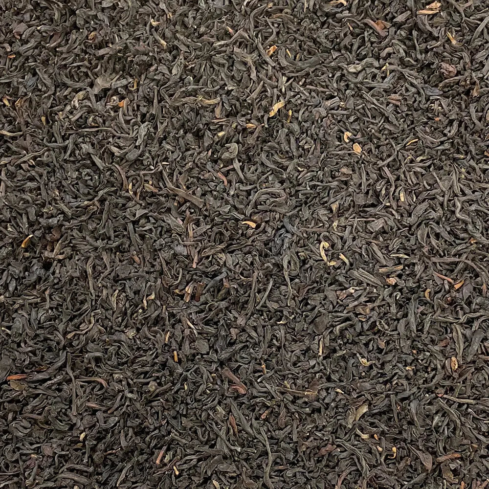 Loose leaf Scottish Breakfast Tea by High Teas, showcasing dark tea leaves in a natural, close-up view.