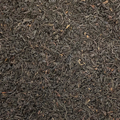 Loose leaf Scottish Breakfast Tea by High Teas, showcasing dark tea leaves in a natural, close-up view.
